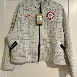 Nike Women's Quilted Jacket with Olympic Team Small
(Very Loose Fit )